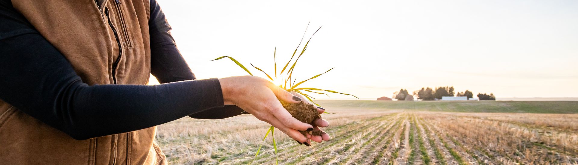 Woman holding a crop in her hands